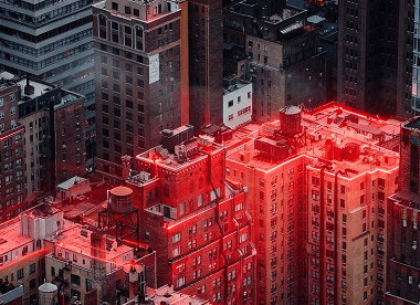 Cityscape view with illuminated buildings representing the launch of modern alarm monitoring systems