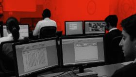 Monitor - VProtect monitoring centre with operators supervising real-time security alerts.